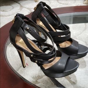 Black leather stilettos heels by Dolce Vita